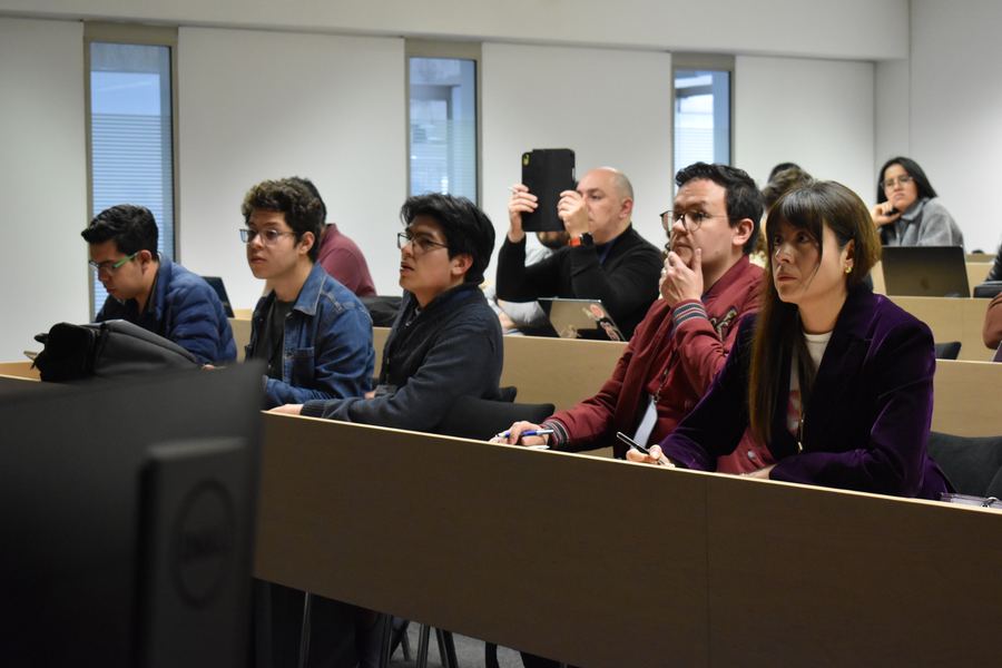 Attendees following a workshop on their laptops